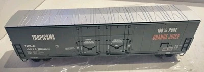 Atlas O Scale Evans 53' Double Plug Door Box Car Tropicana #13065 (3-Rail) - Image 1 of 4