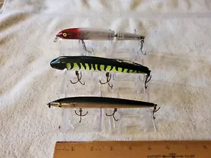Muskie Lures x 3 Minnow Style 1 Rapala 5 1/4", 1 Squirrelly 6" & 6" Jointed Ukn - Picture 1 of 5