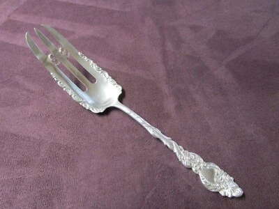 Tenedor para servir pastelería Columbia plateado 1893 estilizado delfín sin monograma P Foto 1 de 4