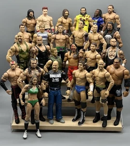 25 Mattel Jakks WWE Wrestling Figuren Elite Roman Reigns Stone Cold Kofi - Bild 1 von 1