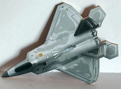 Medalla de cobre coloreada en forma de rapaz F-22 de 1 oz Foto 1 de 3