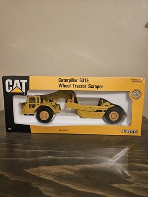 Rascador tractor rueda ERTL Caterpillar 631E escala 1:50 Foto 1 de 4