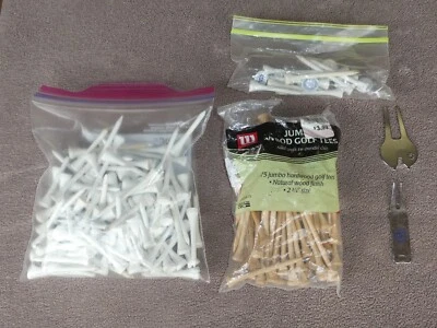 LOTE DE 183 CAMISETAS DE GOLF DE MADERA DURA ALGUNAS JUMBO Y 2 REMOVEDORES DE CAMISETAS DE METAL Foto 1 de 4