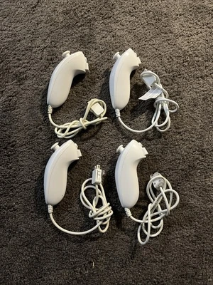 Official OEM 4 pack Lot white Nintendo nunchucks for Nintendo Wii or Wii U - Image 1 of 3