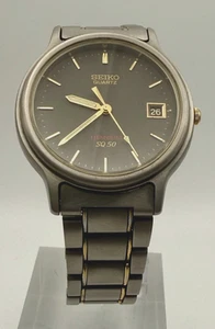 Vintage (2005) Seiko SQ50 35mm Titanium Cal. 7N42 Unisex 5 ATM Classic Watch - Picture 1 of 7
