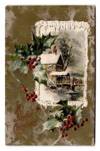 Vintage 1910 Embossed Christmas Postcard Snowy Cottage Holly Design - Picture 1 of 2