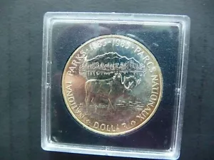 1985 Canada Uncirculated Silver Dollar National Parks Centennial RCM Packaging - Picture 1 of 2