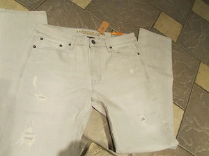 NUOVO JEANS UOMO AMERICAN EAGLE SLIM CORE FLEX 32X34 LT GRIGIO DISTRUTTO SPEDIZIONE GRATUITA - Foto 1 di 9