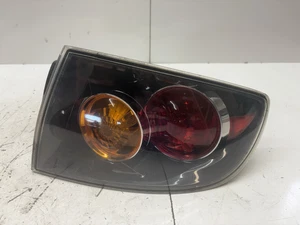 04-06 MAZDA 3 LEFT OUTER TAIL LIGHT ASSEMBLY 04 05 06 - Picture 1 of 8