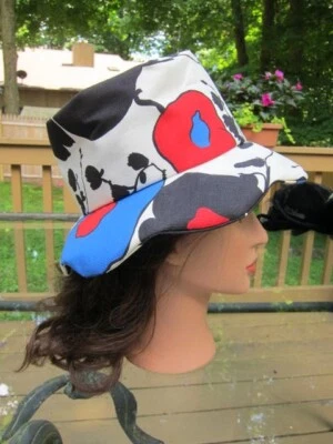 Sombrero de tela con borde negro rojo blanco azul floral grande vintage años 60 70 Foto 1 de 4