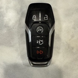 USED OEM 2015 FORD FUSION SMART KEY 5 BUTTON. FCC ID: M3N-A2C31243300 - Picture 1 of 3