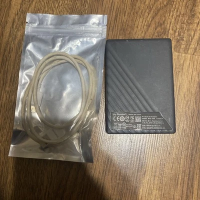 WD My Passport WDBPKJ0050BBK-0A 5TB Portable External USB 3.0 Hard Drive w/wire - Image 1 of 4