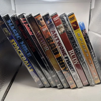 Brand New DVD Lot of 11 All Sealed Rudy Bad Boys 007 Aviator Spaceballs Trespass - Image 1 of 4