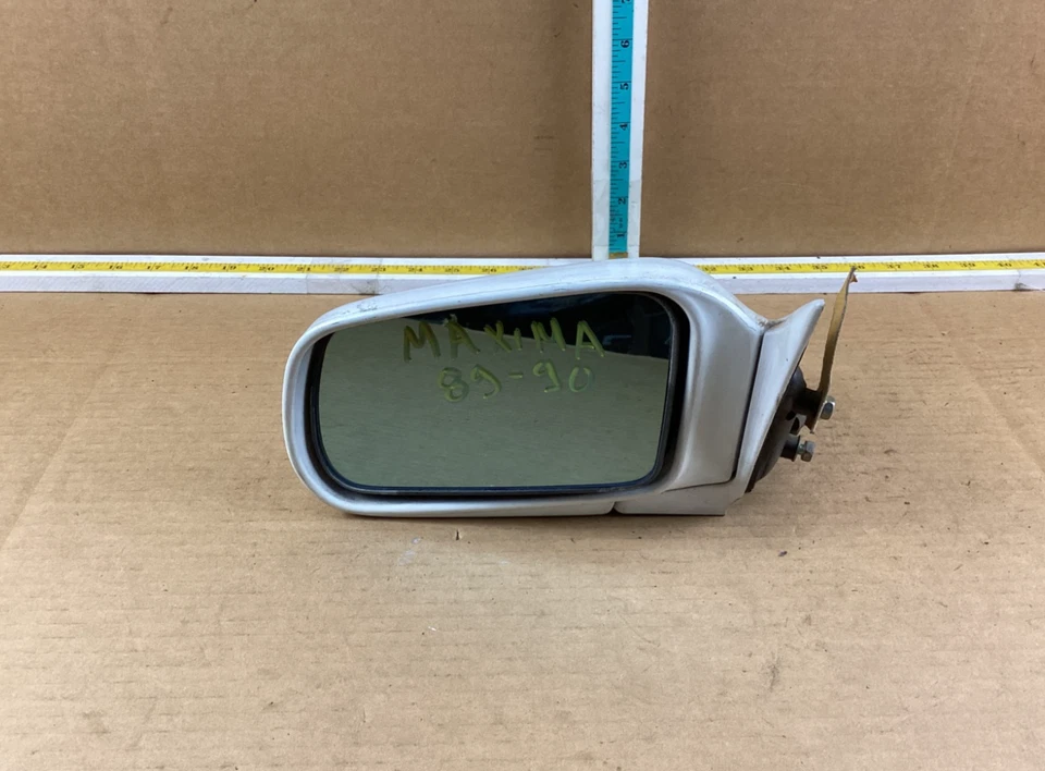 Espejo retrovisor delantero izquierdo del conductor Nissan Máxima 1989-1990 E130187357 OEM Foto 1 de 4