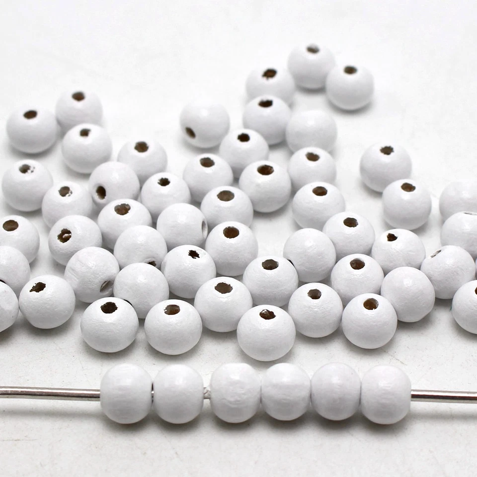 500 piezas Cuentas de madera redondas blancas de 8 mm ~ Cuentas de madera Cuentas espaciadoras Fabricación de joyas Foto 1 de 4