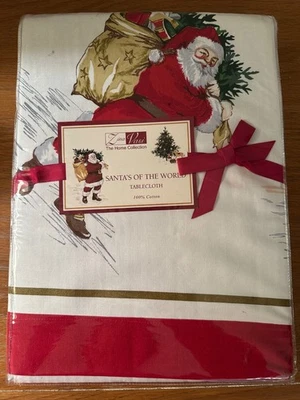 NIP Zina Vasi Christmas Santa's of the World 70"x108" Oblong Holiday Tablecloth - Image 1 of 4