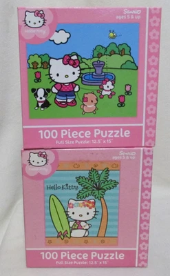 Lote de 2 ~ Sanrio Hello Kitty ~ Rompecabezas de 100 Piezas ~ Surfin Kitty ~ Paseo de Perros ~ Foto 1 de 3