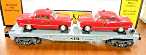RAIL KING/MTH FLATCAR WITH TWO FIRE CHIEF CARS: 30-7623: USED - Picture 1 of 4