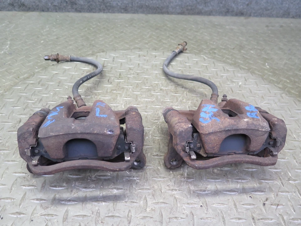 92-98 LEXUS JZZ31L SC300 JUEGO DE 2 PINZAS DE FRENO TRASERAS IZQUIERDA Y DERECHA OEM Foto 1 de 4