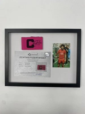 Kapitänsbinde Paul Breitner signiert im Rahmen Bayern München Fußball Autogramm - Bild 1 von 4