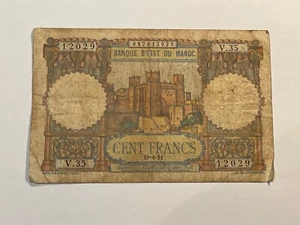 Biglietto Banca Di Stato Del Marocco 100 Franchi 19-4-1951 (146-3) - Picture 1 of 2