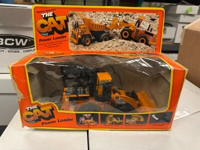 Tractor cargador eléctrico Bright The Cat 992 y camión volquete control remoto en caja de colección 1986 Foto 1 de 2