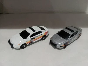 Matchbox Ford Police Interceptor cars x 2 - Picture 1 of 3