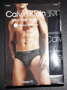 Paquete de 3 calzoncillos de cadera pequeños calce clásico negros elásticos de microfibra Calvin Klein para hombre - Imagen 1 de 3