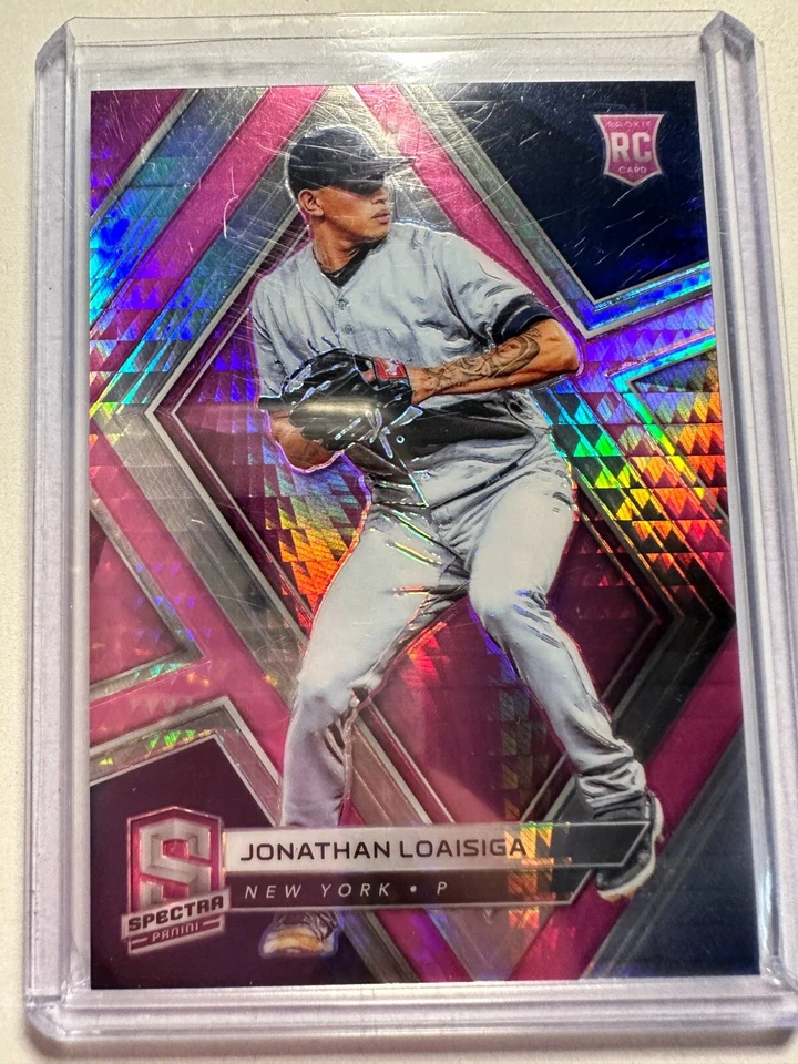 K60,224 - 2019 Panini Spectra Neon Pink #23 Jonathan Loaisiga #/75 - Image 1 of 1
