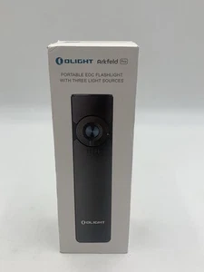 Olight Arkfeld Pro Flat Flashlight with LED Light, UV & Green Beam, 1300 Lumens - Picture 1 of 5