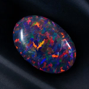 AAA+ Cabujón ovalado de ópalo negro 14x10 mm 3,50 quilates piedra preciosa suelta australiana - Imagen 1 de 6