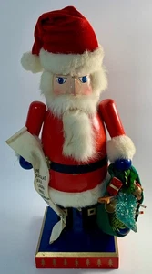 VTG NUTCRACKER  JOLLY SANTA NUTCRACKER w/ List & Presents (MUSIC PLAYS) - Picture 1 of 6