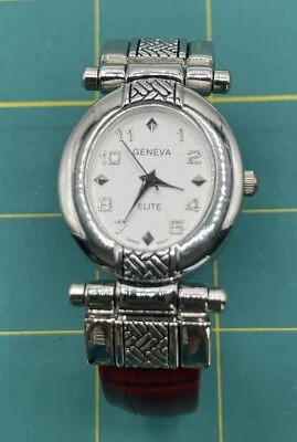Reloj Geneva Puño Banda Roja Tono Plateado Esfera Blanca Mujer Raro Bonito Foto 1 de 4