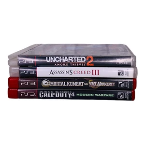 Lot of 4 PS3 Games Uncharted 2 Assassin's Creed 3 Mortal Kombat v DC COD MW - Picture 1 of 9