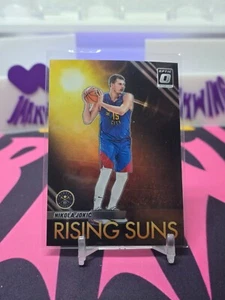 2023-24 Panini Donruss Optic NBA - Nikola Jokić - Rising Suns - Picture 1 of 2