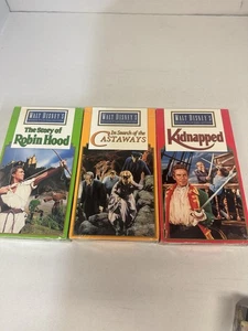 Disney VHS versiegelt 3 Filme Robinhood, entführt und Schiffbrüchige - Bild 1 von 8