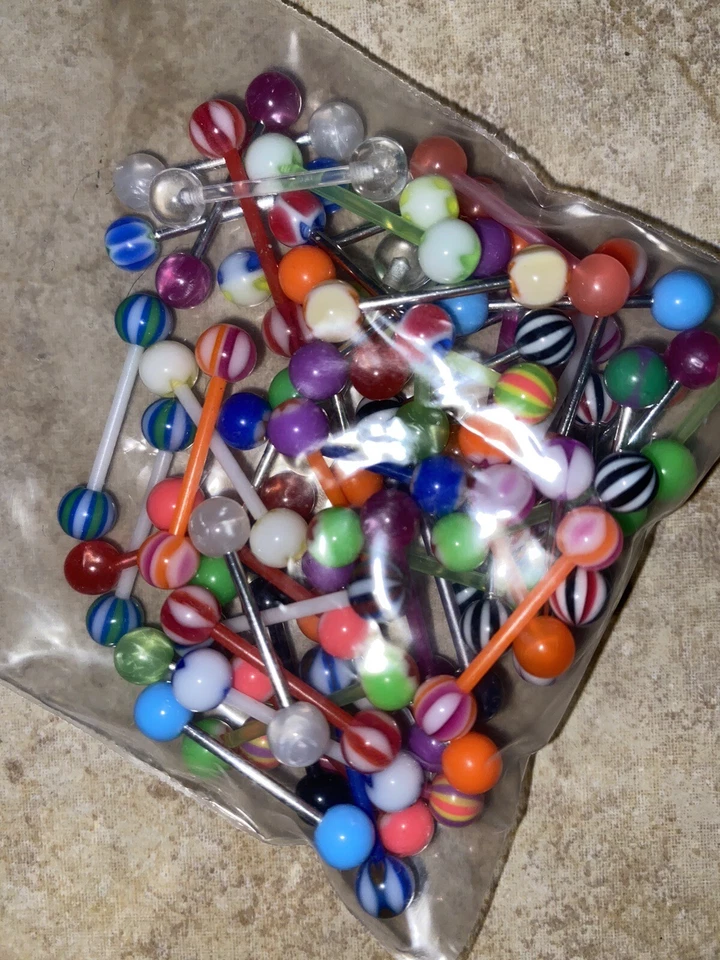 Lote de 60 anillos para pezones lengua barras bolas plástico y metal nuevo medidor estándar Foto 1 de 3
