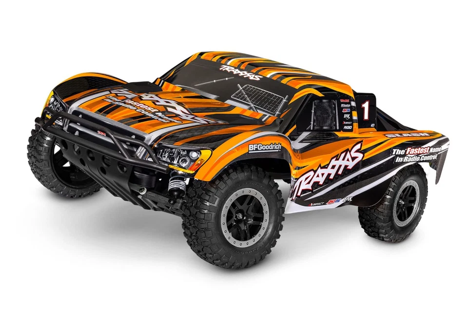 Traxxas Slash Elektro RC Truck 1/10 2WD RTR mit Akku & Lader Orange - Bild 1 von 4