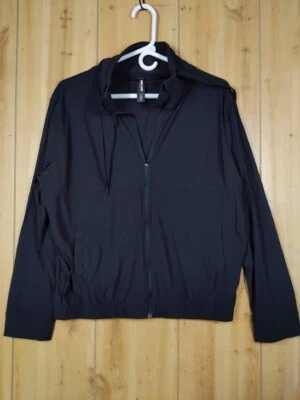 Chaqueta Kirkland Signature para damas activa con cremallera completa pequeña negra elástica al aire libre Foto 1 de 4