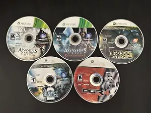 Lote de 5 Juegos Tom Clancys 2 BioShock Assassins Creed Revelation Bandera Negra - Imagen 1 de 5