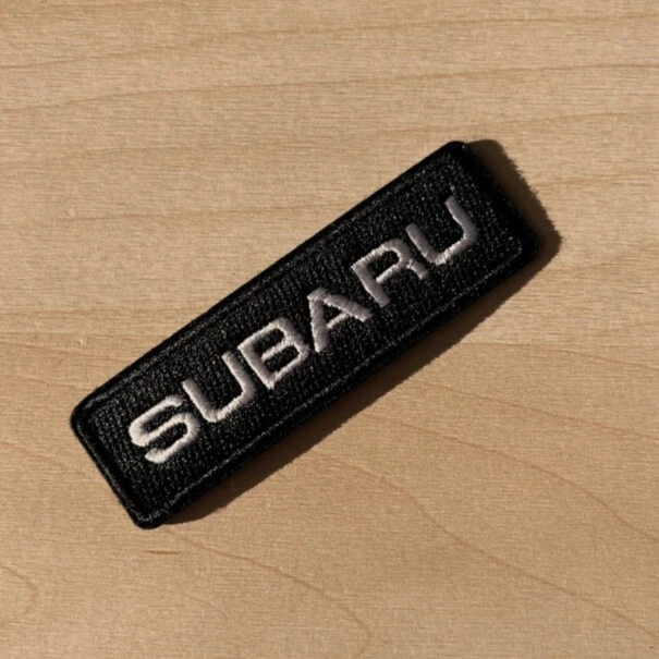 Subaru Automobilia logo Iron on Patch Embroidered White and Black Size 3"x1" - Image 1 of 1