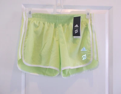 Shorts de corrida Adidas feminino tamanho médio verde limão com forro interno - Imagem 1 de 4