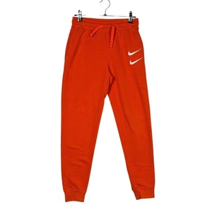 Pantalones deportivos Nike Double Swoosh naranja para niños talla mediana - Imagen 1 de 7