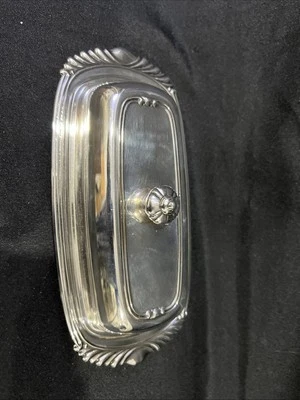 Plato de mantequilla vintage plateado con patas enrollables Foto 1 de 4