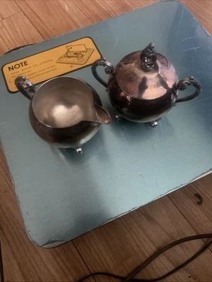 Crema y azucarero plateados sobre cobre Foto 1 de 4