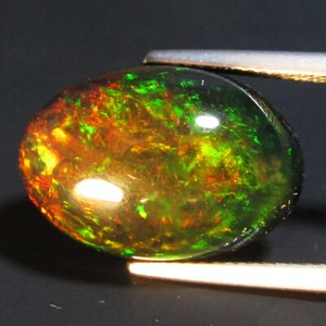 9.11Cts Natural Color Play Ethiopian Black Opal Oval Cabochon Loose Gem VOD - Picture 1 of 4