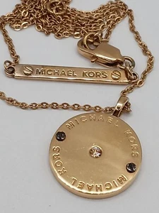 Michael Kors Logo Disc Pendant Heritage Necklace Gold Tone Crystal Center Stone - Picture 1 of 6