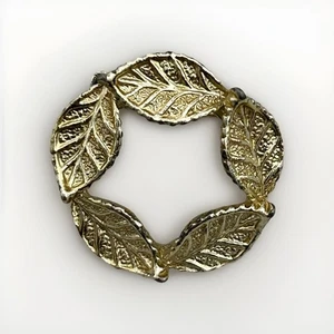 Precioso prendedor de hojas en tono dorado de Gerry’s - Imagen 1 de 2