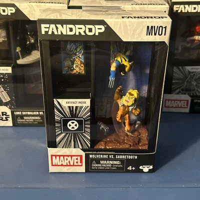 Paquete de 2 figuras Moose Toys Marvel FANDROP MV01, Wolverine vs. Sabretooth nuevas Foto 1 de 4