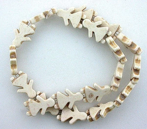 23 mm x 16 mm Mädchen im Kleid Büffel Türkis Magnesit Perlen 16 Zoll Strang  - Bild 1 von 1